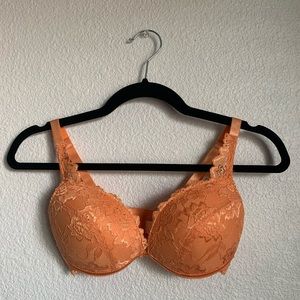 Orange lace Fredericks of Hollywood push up bra